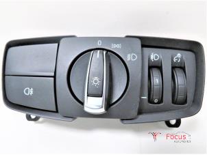 Używane Przelacznik swiatel BMW 1 serie (F20) 116d 1.6 16V Efficient Dynamics Cena € 22,95 Procedura marży oferowane przez Focus Automotive