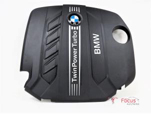 Usados Chapa protectora motor BMW 1 serie (F20) 116d 1.6 16V Efficient Dynamics Precio € 35,00 Norma de margen ofrecido por Focus Automotive