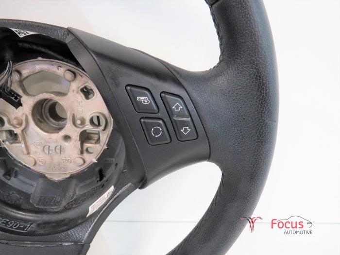 Steering wheel from a BMW X1 (E84) xDrive 18d 2.0 16V 2013