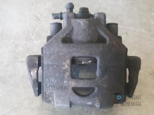 Used Front brake calliper, right Toyota Yaris II (P9) 1.0 12V VVT-i Price € 10,00 Margin scheme offered by Autodemontage Veenendaal BV