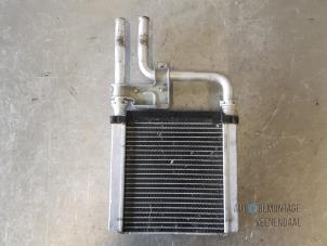 Used Heating radiator Daihatsu Sirion/Storia (M1) 1.0 12V DVVT Price € 20,00 Margin scheme offered by Autodemontage Veenendaal BV