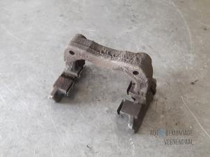 Used Rear brake calliperholder, right Peugeot 208 I (CA/CC/CK/CL) 1.6 e-HDi FAP Price € 15,75 Margin scheme offered by Autodemontage Veenendaal BV