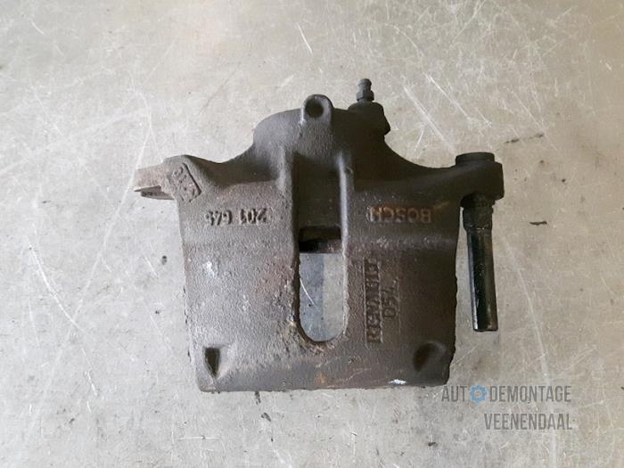 Front brake calliper, left from a Renault Kangoo (KC) 1.2 16V 2004