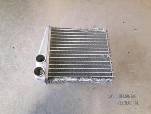 Used Heating radiator Nissan Note (E11) 1.4 16V Price € 36,75 Margin scheme offered by Autodemontage Veenendaal BV