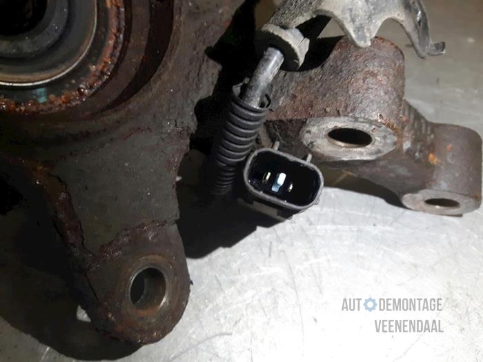 Knuckle, front left from a Hyundai i10 (F5) 1.2i 16V 2012