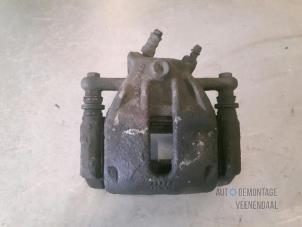 Used Front brake calliper, left Renault Clio III (BR/CR) 1.5 dCi 85 Price € 10,00 Margin scheme offered by Autodemontage Veenendaal BV