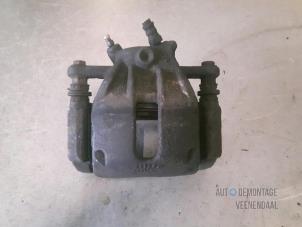 Used Front brake calliper, right Renault Clio III (BR/CR) 1.5 dCi 85 Price € 9,00 Margin scheme offered by Autodemontage Veenendaal BV