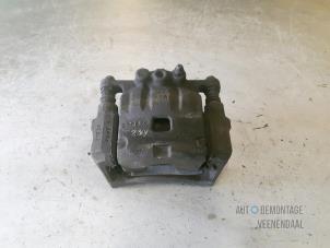 Used Front brake calliper, left Ford Fiesta 6 (JA8) 1.4 TDCi Price € 18,00 Margin scheme offered by Autodemontage Veenendaal BV