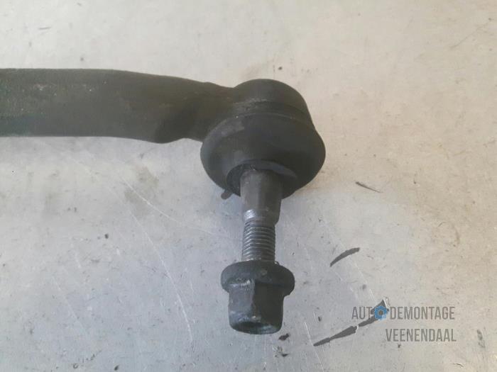 Tie rod, left from a Nissan Micra (K12) 1.2 16V 2009