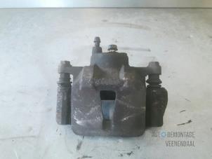 Used Front brake calliper, right Toyota Yaris (P1) 1.0 16V VVT-i Price € 10,00 Margin scheme offered by Autodemontage Veenendaal BV