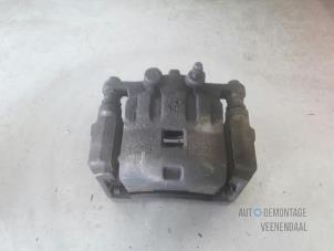 Used Front brake calliper, left Mazda 2 (DE) 1.5 16V S-VT Price € 20,00 Margin scheme offered by Autodemontage Veenendaal BV