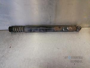 Used Rear shock absorber, left Renault Clio III (BR/CR) 1.4 16V Price € 9,00 Margin scheme offered by Autodemontage Veenendaal BV