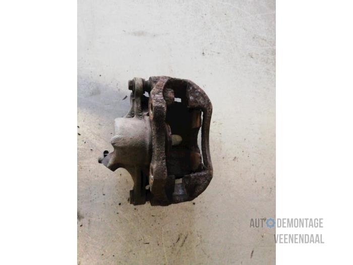 Front brake calliper, left from a Renault Kangoo (KC) 1.9 D 55 2000