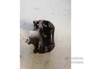Used Front brake calliper, left Renault Kangoo (KC) 1.9 D 55 Price € 10,00 Margin scheme offered by Autodemontage Veenendaal BV