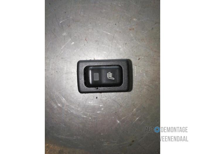 Interruptor de calefactor de asiento de un Mazda RX-8 (SE17) M5 2009