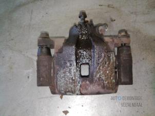 Used Rear brake calliper, left Kia Sorento I (JC) 2.5 CRDi 16V VGT Price € 39,90 Margin scheme offered by Autodemontage Veenendaal BV