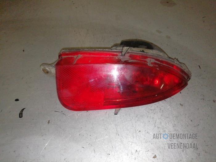 Taillight, left from a Opel Corsa C (F08/68) 1.3 CDTi 16V 2004