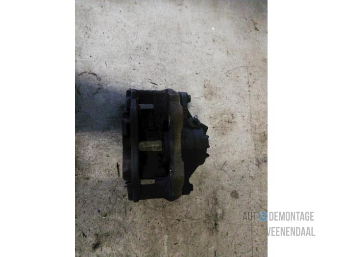 Front brake calliper, left from a Peugeot 208 I (CA/CC/CK/CL) 1.6 e-HDi FAP 2014