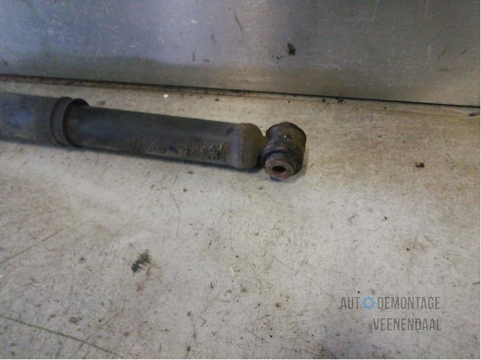 Rear shock absorber, right from a Peugeot 208 I (CA/CC/CK/CL) 1.6 e-HDi FAP 2014