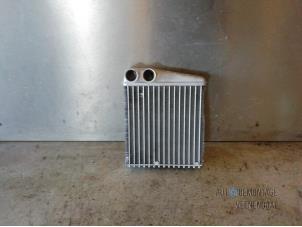 Used Heating radiator Nissan Note (E11) 1.6 16V Price € 35,00 Margin scheme offered by Autodemontage Veenendaal BV