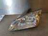 Headlight, left from a Ford Focus 2 1.6 16V 2007