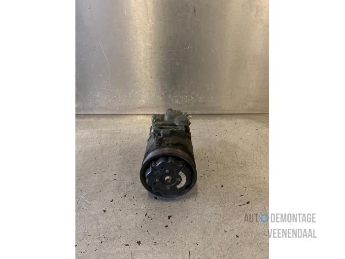 Air conditioning pump from a Seat Ibiza III (6L1) 1.4 16V 75 2004