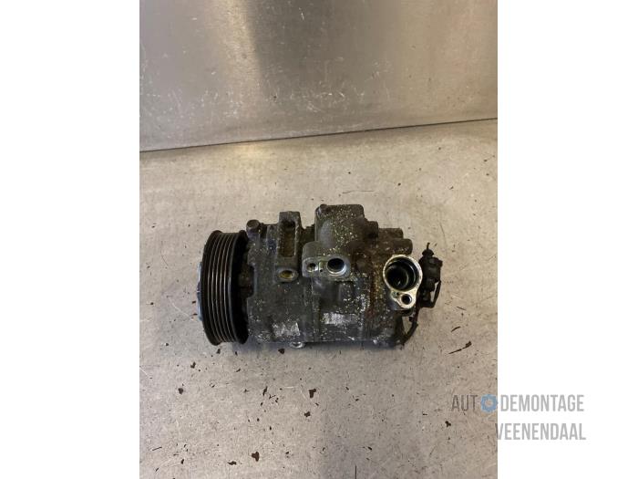 Air conditioning pump from a Seat Ibiza III (6L1) 1.4 16V 75 2004