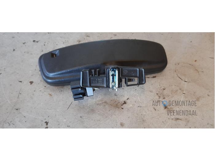 Rear view mirror from a Opel Corsa D 1.4 16V Twinport 2008