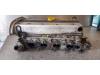 Cylinder head from a Opel Frontera (6B) 2.2i 16V 2003