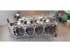 Cylinder head from a Opel Frontera (6B) 2.2i 16V 2003
