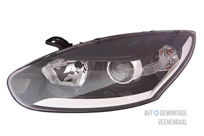 Headlight, left from a Renault Megane III Berline (BZ)  2014