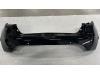 Rear bumper from a Renault Clio IV (5R) 0.9 Energy TCE 90 12V 2014