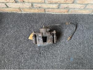 Used Front brake calliper, left Chevrolet Nubira Wagon (J100) 1.6 16V Price € 20,00 Margin scheme offered by Autodemontage Veenendaal BV