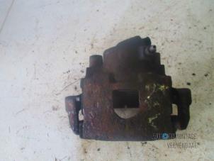Used Front brake calliper, left Ford Fiesta 4 1.3 Price € 20,00 Margin scheme offered by Autodemontage Veenendaal BV