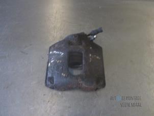 Used Front brake calliper, left Ford Fiesta 5 (JD/JH) 1.4 16V Price € 10,00 Margin scheme offered by Autodemontage Veenendaal BV