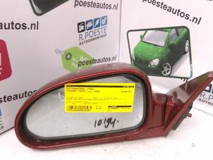 Used Wing mirror, left Hyundai Coupe 2.0i 16V Price € 25,00 Margin scheme offered by Autodemontagebedrijf R. Poeste B.V.