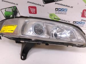 Used Headlight, right Opel Omega B (25/26/27) 2.0i 16V Price € 10,00 Margin scheme offered by Autodemontagebedrijf R. Poeste B.V.