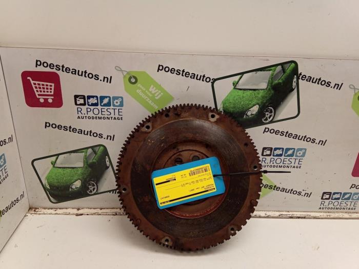 Used Flywheel Peugeot 207/207+ (WA/WC/WM) 1.4 16V Price € 90,00 Margin scheme offered by Autodemontagebedrijf R. Poeste B.V.