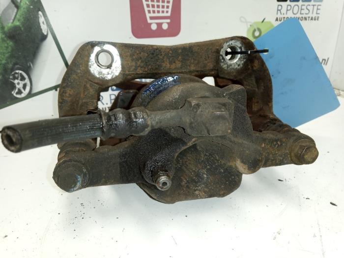 Front brake calliper, right from a Opel Corsa C (F08/68) 1.3 CDTi 16V 2005