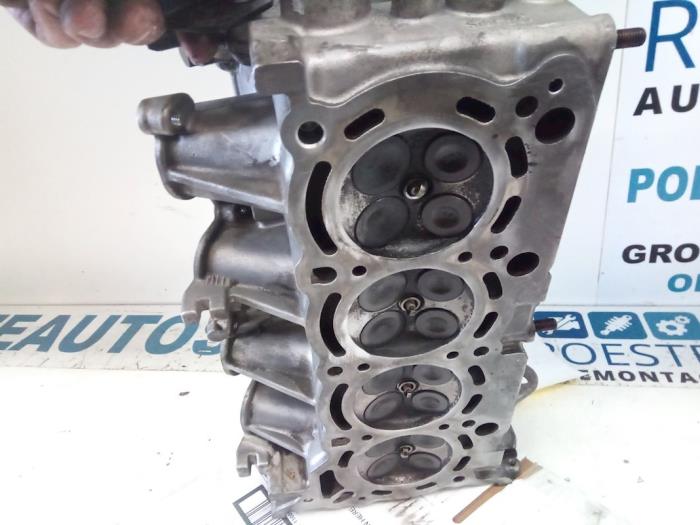 Cylinder head Mitsubishi Colt 1.5 16V CZ3 MN155154K 135950