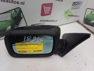 Used Wing mirror, left BMW 3 serie Touring (E36/3) 318i Price € 30,00 Margin scheme offered by Autodemontagebedrijf R. Poeste B.V.
