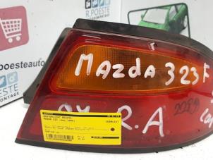 Używane Tylne swiatlo pozycyjne prawe Mazda 323 C (BA13) 1.5i 16V Cena € 10,00 Procedura marży oferowane przez Autodemontagebedrijf R. Poeste B.V.