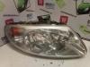 Headlight, right from a Chrysler Voyager/Grand Voyager (RG) 2.4 16V 2003