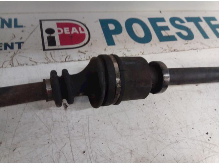 Front drive shaft, right from a Renault Grand Scénic II (JM) 1.5 dCi 100 2004