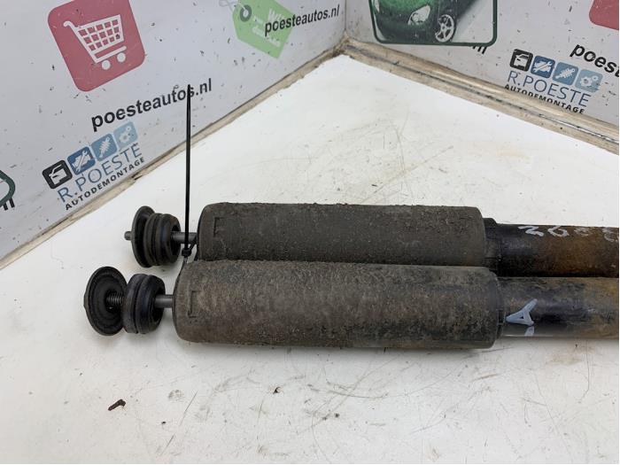 Shock absorber kit from a Opel Corsa C (F08/68) 1.0 12V Twin Port 2004