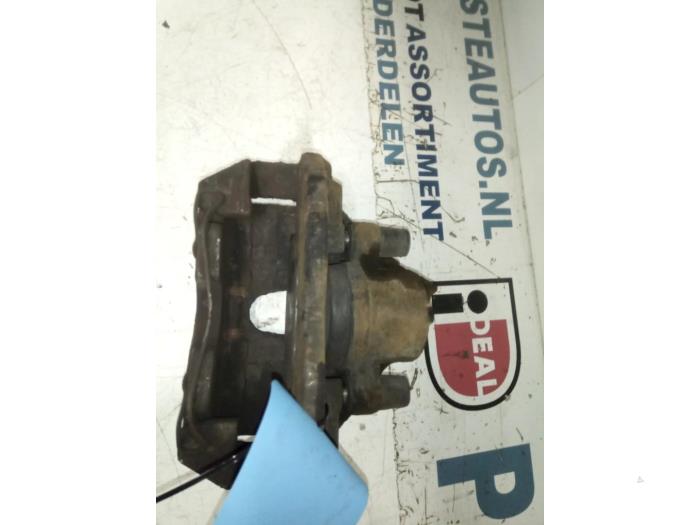 Front brake calliper, left from a Ford Transit Connect 1.8 TDCi 90 2007