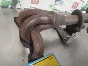 Used Exhaust manifold Ford Mondeo III Wagon 1.8 16V Price € 40,00 Margin scheme offered by Autodemontagebedrijf R. Poeste B.V.