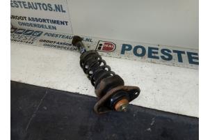 Used Rear shock absorber rod, left BMW Mini One/Cooper (R50) 1.6 16V One Price € 30,00 Margin scheme offered by Autodemontagebedrijf R. Poeste B.V.