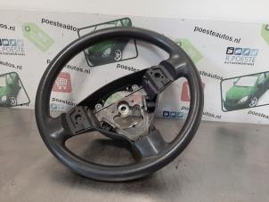 Used Steering wheel Nissan Pixo (D31S) 1.0 12V Price € 20,00 Margin scheme offered by Autodemontagebedrijf R. Poeste B.V.
