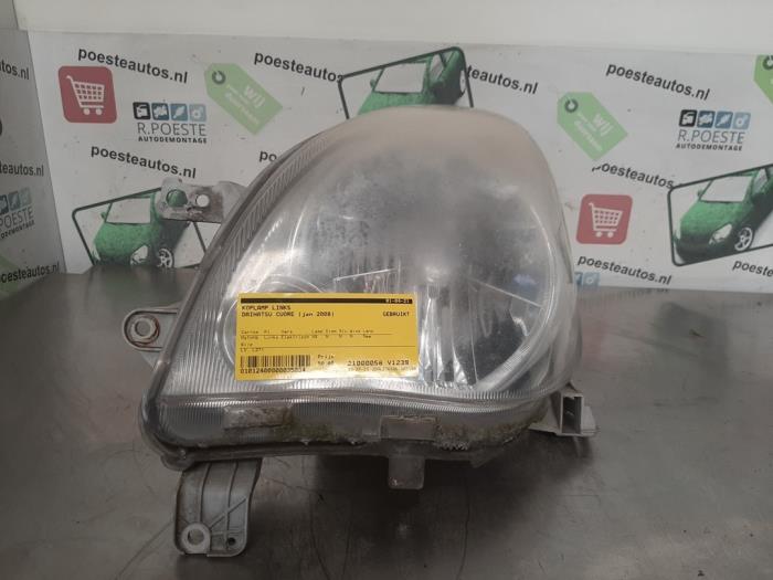 Headlight, left Daihatsu Cuore/Domino 1.0 12V DVVT